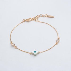 PULSEIRA FOLHEADO A OURO COM ZIRCÔNIAS E FLOR DE OLHO GREGO