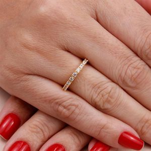 ANEL FOLHEADO A OURO MEIA ALIANÇA COM ZIRCÔNIAS CRISTAL