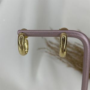 BRINCO FOLHEADO A OURO ARGOLA OVAL COM RISCADOS LISOS
