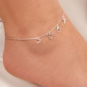 TORNOZELEIRA PRATA COM CARTIER COM PINGENTES LISOS E VAZADOS