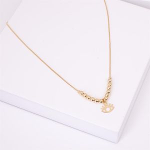 COLAR FOLHEADO A OURO COM BOLAS E OLHO VAZADO