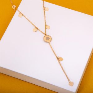 COLAR FOLHEADO A OURO GRAVATA CORAÇÕES PENDURADOS E MEDALHA