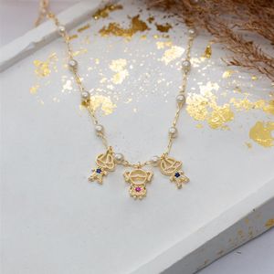 COLAR FOLHEADO A OURO COM MINI PÉROLA E 2 MENINOS E 1 MENINA