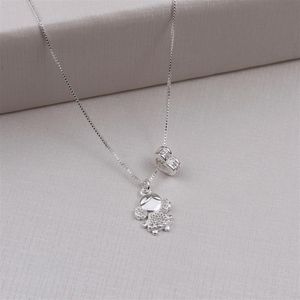COLAR PRATA CORAÇÃO VAZADO E MENINA COM ZIRCÔNIAS