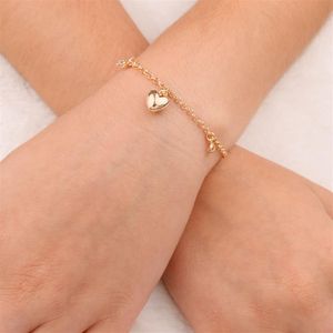 PULSEIRA FOLHEADO A OURO ELO COM ZIRCÔNIAS E CORAÇÃO LISO
