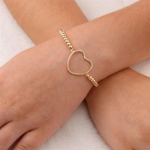 PULSEIRA FOLHEADO A OURO FIO DE BOLAS COM CORAÇÃO