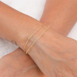 PULSEIRA FOLHEADO A OURO 2 FIOS SENDO CARTIER E MINI CORAÇÕES