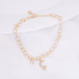 PULSEIRA FOLHEADO A OURO ELOS COM ZIRCÔNIA E LUA COM ESTRELA