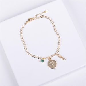 PULSEIRA FOLHEADO A OURO COM PALAVRA E SIMBOLO DO ELEMENTO TERRA