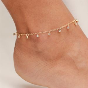 TORNOZELEIRA FOLHEADO A OURO MINI ZIRCÔNIAS CRISTAIS