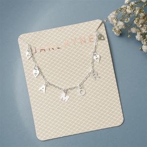 COLAR PRATA FIO COM AMOR E CORAÇÕES PENDURADOS