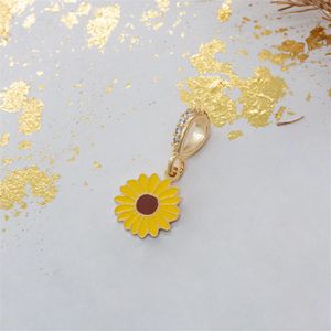 PINGENTE FOLHEADO A OURO FLOR SIMBOLO DE DEFICIENCIAS OCULTAS