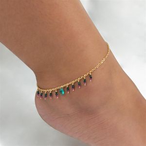 TORNOZELEIRA FOLHEADO A OURO COM GOTA E RONDEL PENDURADOS