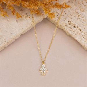 COLAR FOLHEADO A OURO COM MENINA DE ZIRCÔNIAS