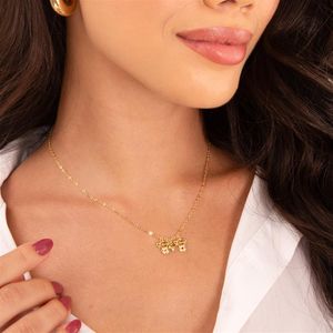 COLAR FOLHEADO A OURO COM MENINAS TRABALHADAS E MINI CORAÇÃO