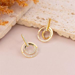 BRINCO FOLHEADO A OURO PALITO DE ZIRCÔNIAS COM AROS TRABALHADOS