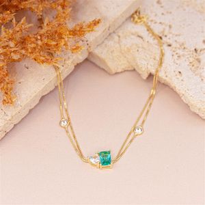 PULSEIRA FOLHEADO A OURO DOIS FIOS COM ZIRCÔNIAS RETANGULAR E CORAÇÃO