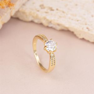 ANEL FOLHEADO A OURO COM ZIRCÔNIAS E SOLITÁRIO