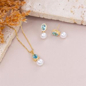 CONJUNTO FOLHEADO A OURO DE ZIRCÔNIA OVAL E PÉROLA
