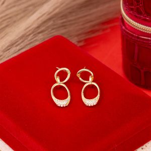 BRINCO FOLHEADO A OURO AROS LISOS E COM ZIRCÔNIAS