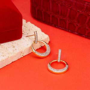 BRINCO FOLHEADO A OURO PALITO COM ARO DE ZIRCÔNIAS