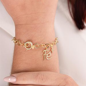 PULSEIRA FOLHEADO A OURO COM FÉ E CRUZ DE ZIRCÔNIAS