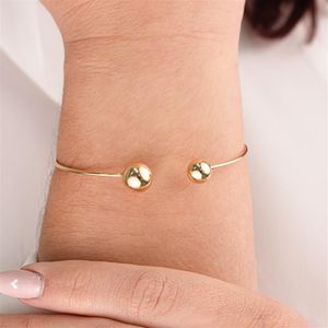 BRACELETE FOLHEADO A OURO ABERTO COM BOLAS